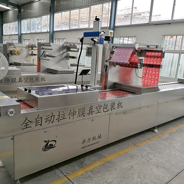 雙面拉伸膜真空包裝機(jī) 雙面拉伸膜真空包裝機(jī)